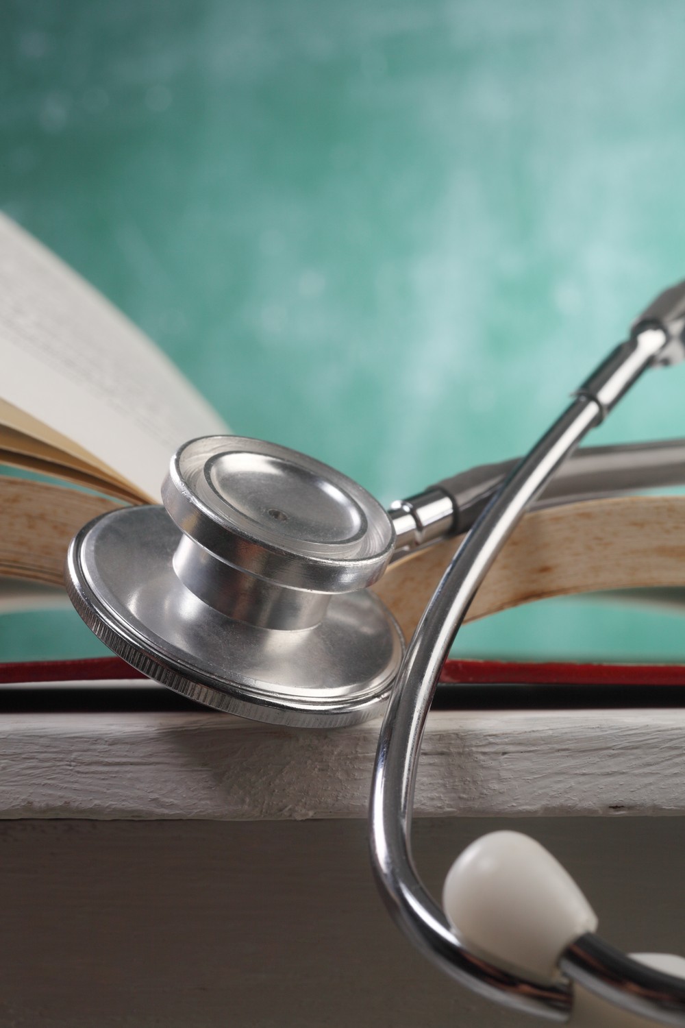stethoscope resting on the book